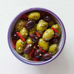 Load image into Gallery viewer, The Real Olive Co. - Siciliana Olives garlic,peppers, mustard seeds - 185g Deli Po
